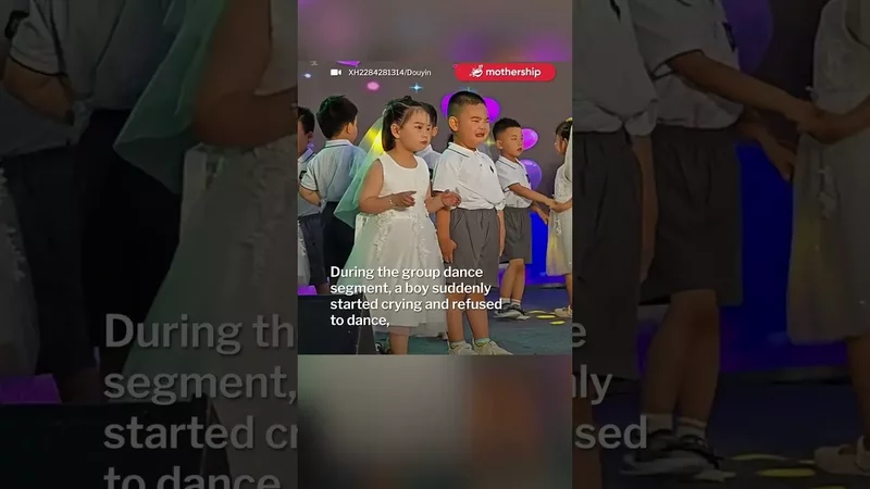 Girl didn't let crying partner stop her from dancing at kindergarten's Children's Day performance