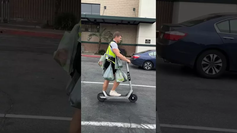 Single father takes groceries home to his wife and kids on a scooter. He even fit a watermelon!