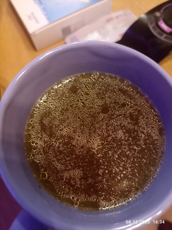 Бульон куриный прозрачный с блинами, начиненными кашей